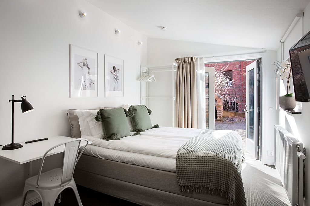 Garden Deluxe Studio | Individually decorated, individually furnished, desk, blackout drapes