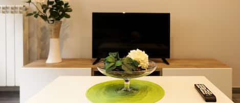 Kattohuoneisto, 3 makuuhuonetta | Olohuone | Taulutelevisio