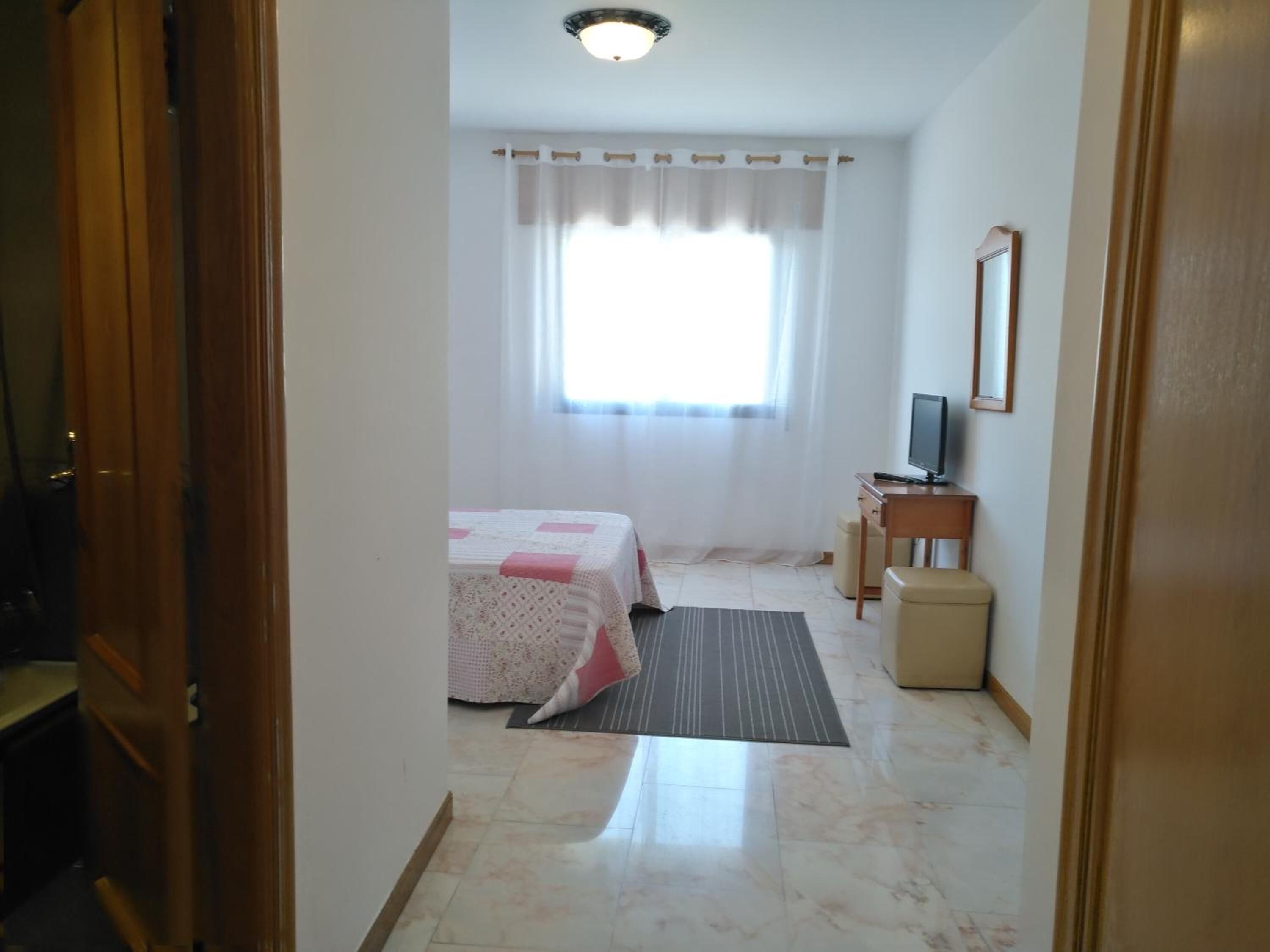 Desk, blackout curtains, free WiFi, bed sheets