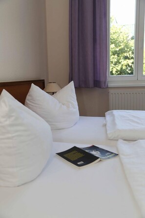 Desk, free WiFi, bed sheets