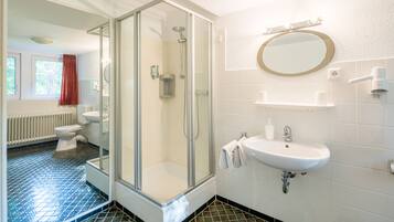 Shower, free toiletries, hair dryer, towels