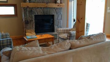 Family Cottage, 5 Bedrooms, Lake View, Lakeside | Living area | Flat-screen TV, fireplace