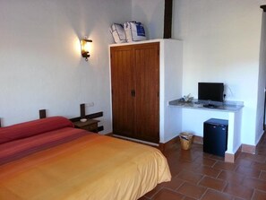Quarto casal ou duplo | Frigobar, cofres nos quartos, Wi-Fi de cortesia, roupa de cama