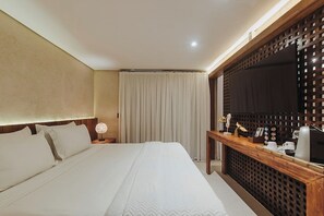 Quarto duplo | 1 quarto, frigobar, cortinas blackout, Wi-Fi de cortesia
