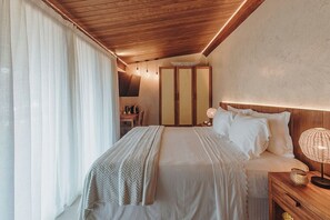 Suíte, suíte, vista para o mar | Frigobar, cortinas blackout, Wi-Fi de cortesia, roupa de cama