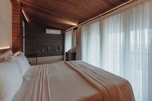 Suíte, suíte, vista para o mar | Frigobar, cortinas blackout, Wi-Fi de cortesia, roupa de cama