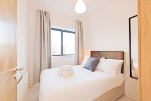 1 habitación, tabla de planchar con plancha, wifi gratis y ropa de cama 