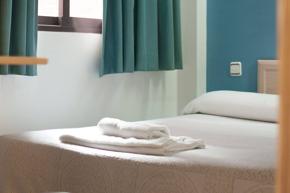 Desk, blackout curtains, free cots/infant beds, free rollaway beds