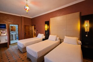 Quadruple Room (Adrar) | Iron/ironing board, free cribs/infant beds, free WiFi, bed sheets