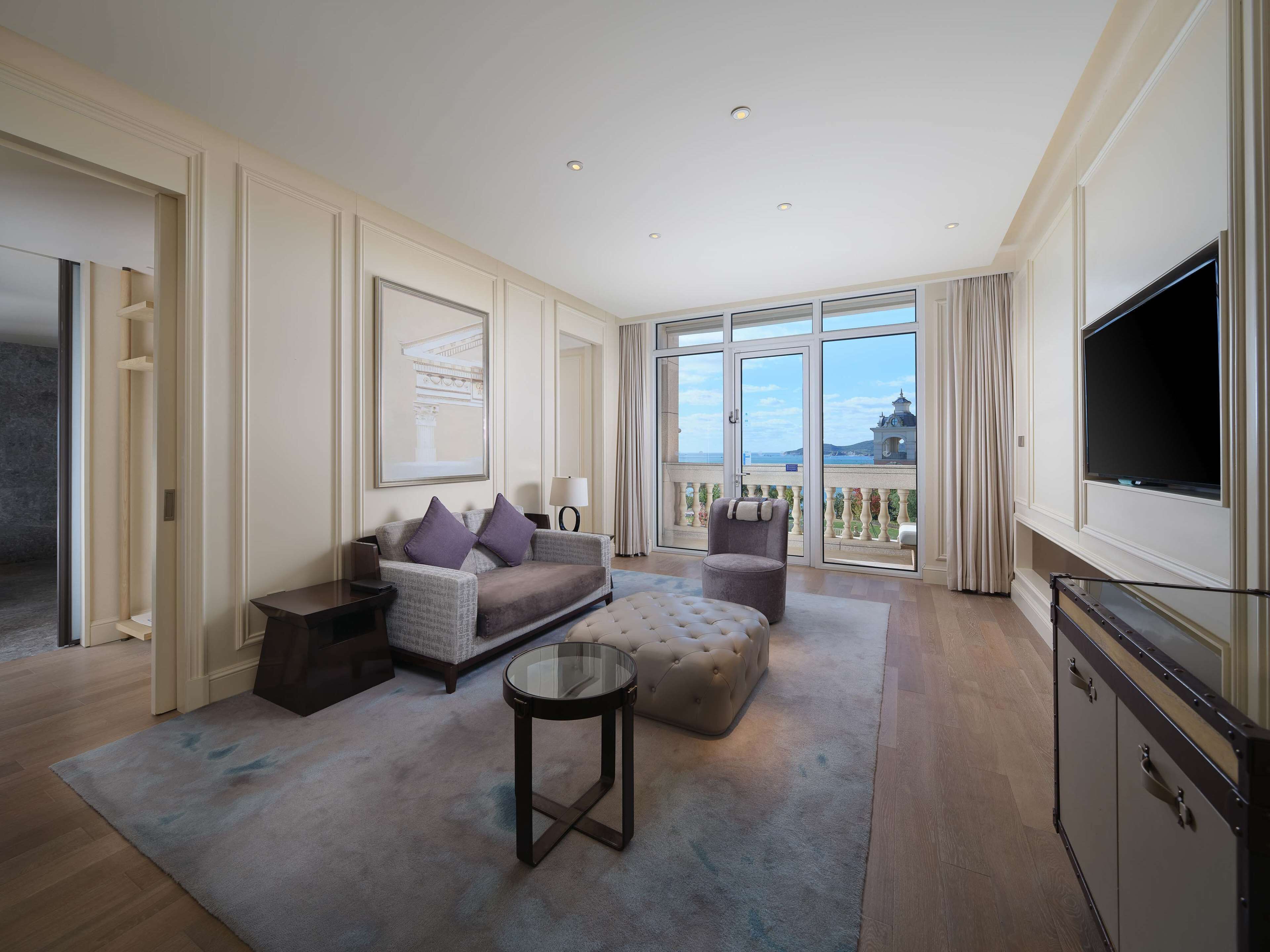 deluxe suite, 1 bedroom, ocean view | living area | lcd tv, toys