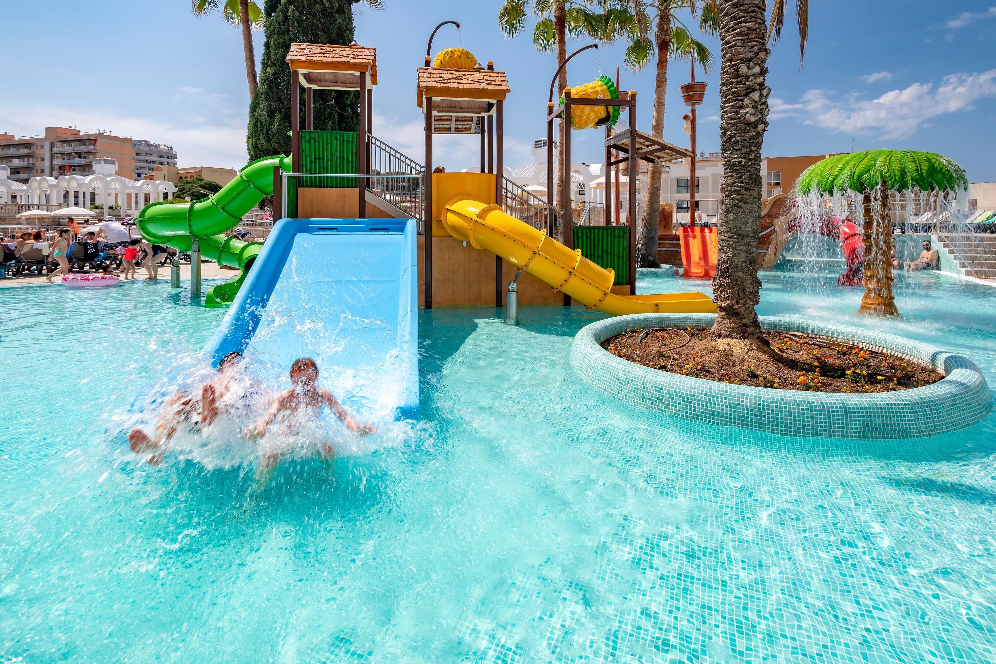 A water park with slides and a pool.