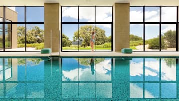 Indoor pool, outdoor pool, free pool cabanas, pool umbrellas