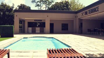 Outdoor pool, pool umbrellas, pool loungers