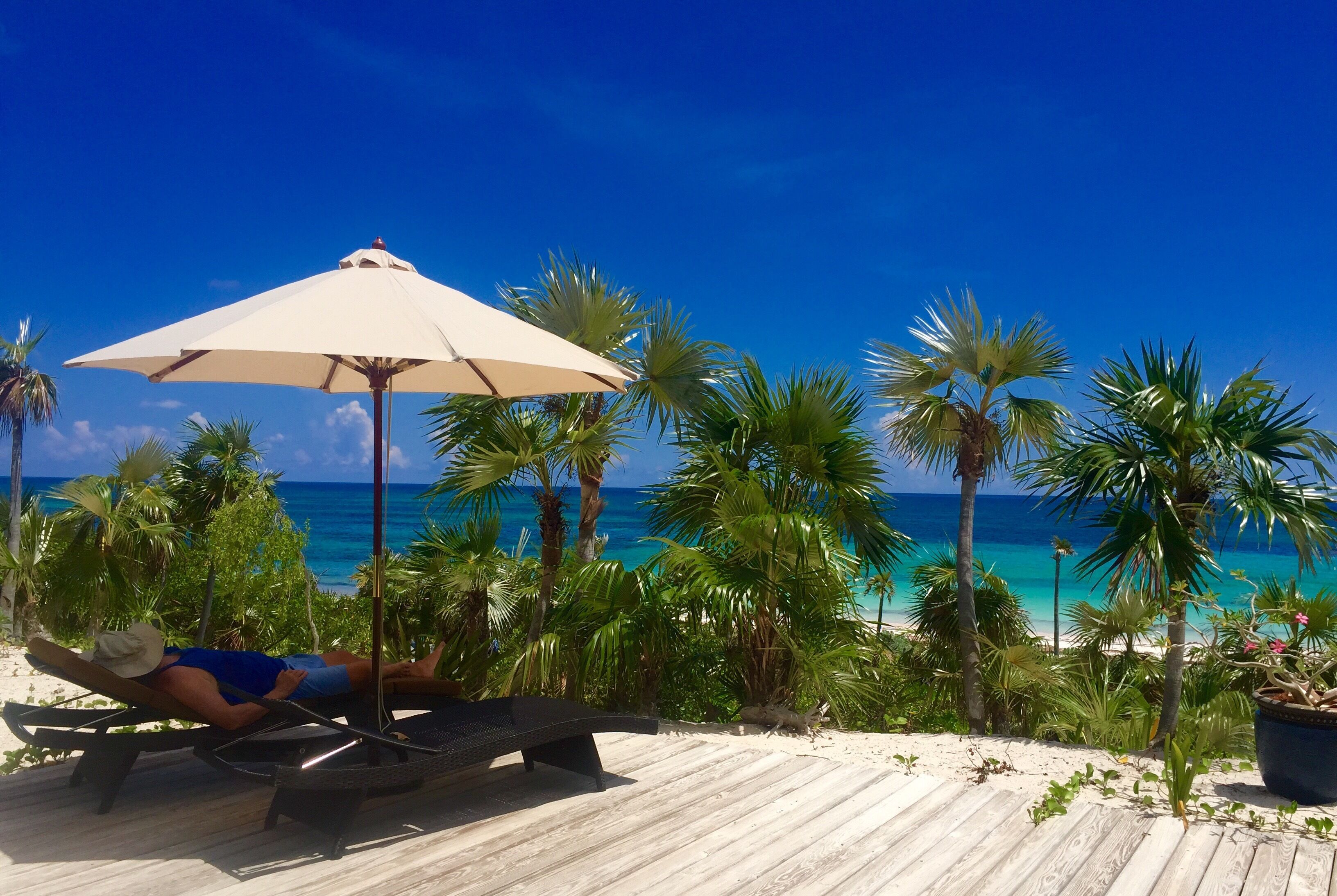 Enjoying the sundeck overlooking the ocean at Ocean Daze Villa.
