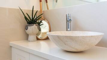 Shower, eco-friendly toiletries, hair dryer, towels