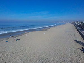 On the beach, sun loungers, beach towels