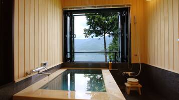 Shower, free toiletries, hair dryer, slippers