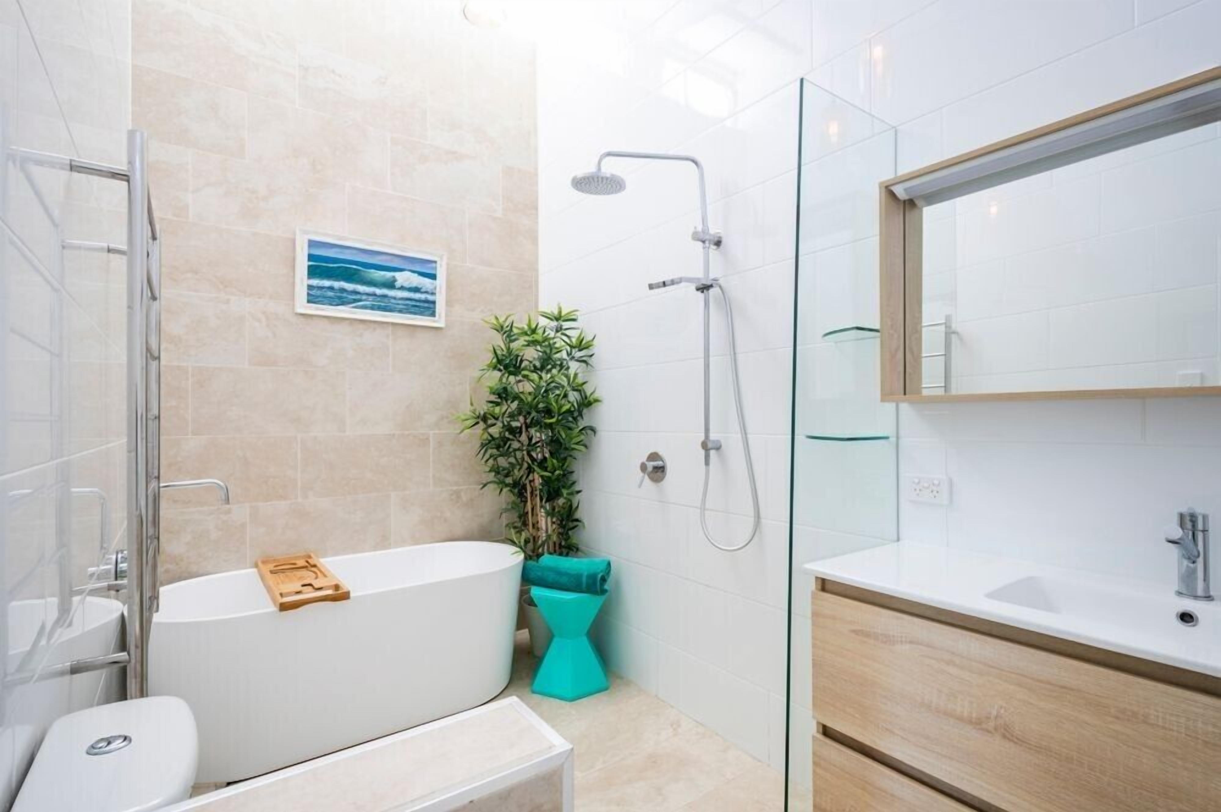 Shower, rainfall showerhead, hair dryer, towels