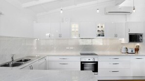 Coffee/tea maker, fridge, microwave, oven
