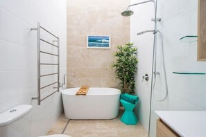 Shower, rainfall showerhead, hair dryer, towels