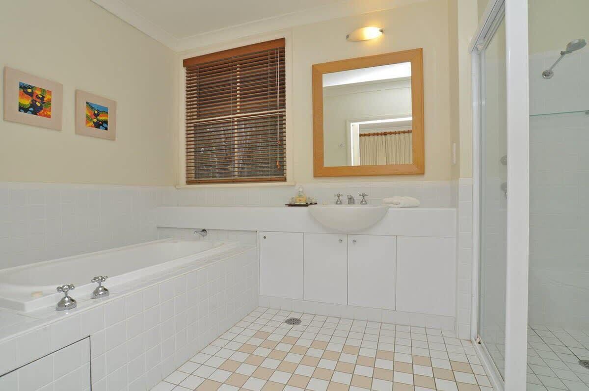 Bathtub, eco-friendly toiletries, hair dryer