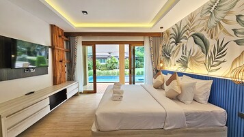 Family Pool Villa | Minibar, in-room safe, individually decorated, desk