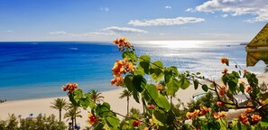 On the beach, sun loungers, beach towels