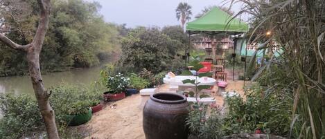 Standard Double Room | Living area | 32-inch LCD TV with satellite channels, TV