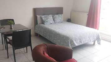 Iron/ironing board, travel crib, free WiFi, bed sheets