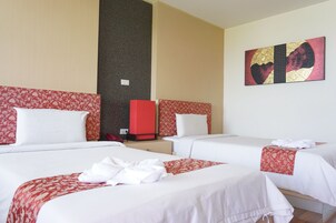 Habitación Deluxe con 2 camas individuales | Caja fuerte, cortinas opacas, wifi gratis