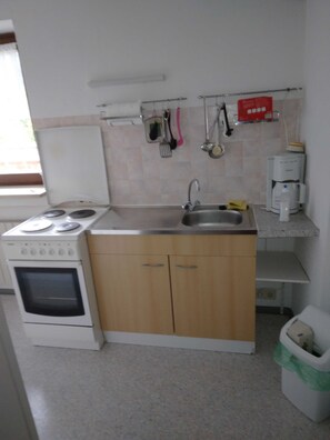 Fridge, oven, electric kettle, toaster
