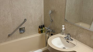 Combined shower/tub, deep soaking tub, free toiletries, hair dryer