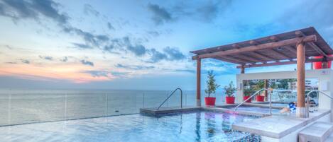 A rooftop pool, a heated pool