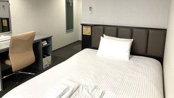 Desk, blackout drapes, free WiFi, bed sheets