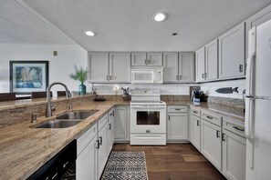 Fridge, microwave, oven, stovetop - Bay Front Condo-2br/2ba , Pool, Hot Tub, Lr Balcony W/ Beautiful Sunsets, WIFI.  (Ocean City)