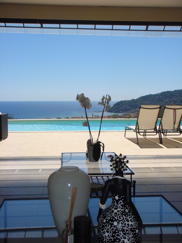 Enjoy ocean views from this tranquil outdoor space, perfect for relaxation or dining.