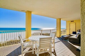 Outdoor dining - Summer House 301B | Beach front with beach views and deck access from every room! (Orange Beach)