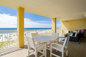 Outdoor dining - Summer House 301B | Beach front with beach views and deck access from every room! (Orange Beach)