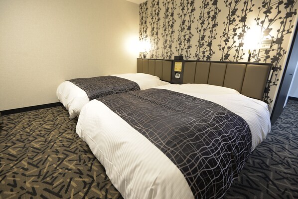 Desk, blackout curtains, free WiFi, bed sheets