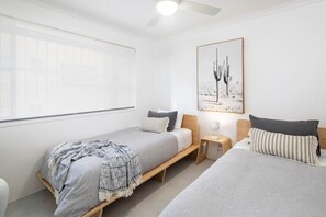 2 bedrooms, desk, iron/ironing board, travel crib