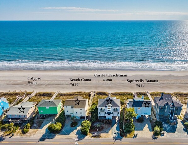 Stunning ocean views from this coastal neighborhood, featuring four charming homes with star-rated amenities.