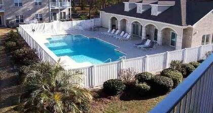 Extra large first floor condo with indoor & outdoor pools, close to the beach.