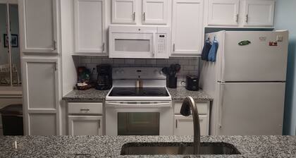 Extra large first floor condo with indoor & outdoor pools, close to the beach.