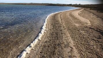 On the beach, beach towels
