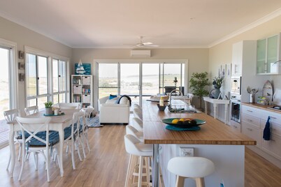Relax & unwind at Shades of Blue Eco Retreat. Stunning bayviews & private beach