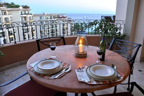 Dinner on the balcony at dusk