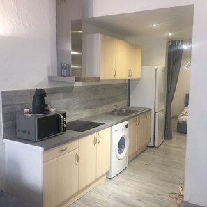 Fridge, microwave, stovetop, coffee/tea maker