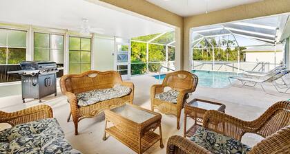 Fenced, private, family friendly villa with exotic poolside views near airport.