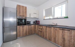 Refrigerador, microondas, parrilla de estufa y lavavajillas 
