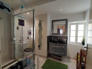 Shower, hair dryer, towels, soap